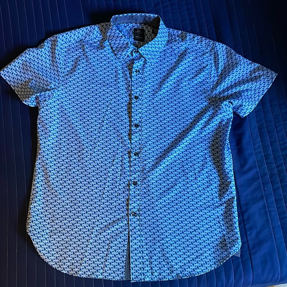 Men’s light weight casual dress shirt.  Slim fit